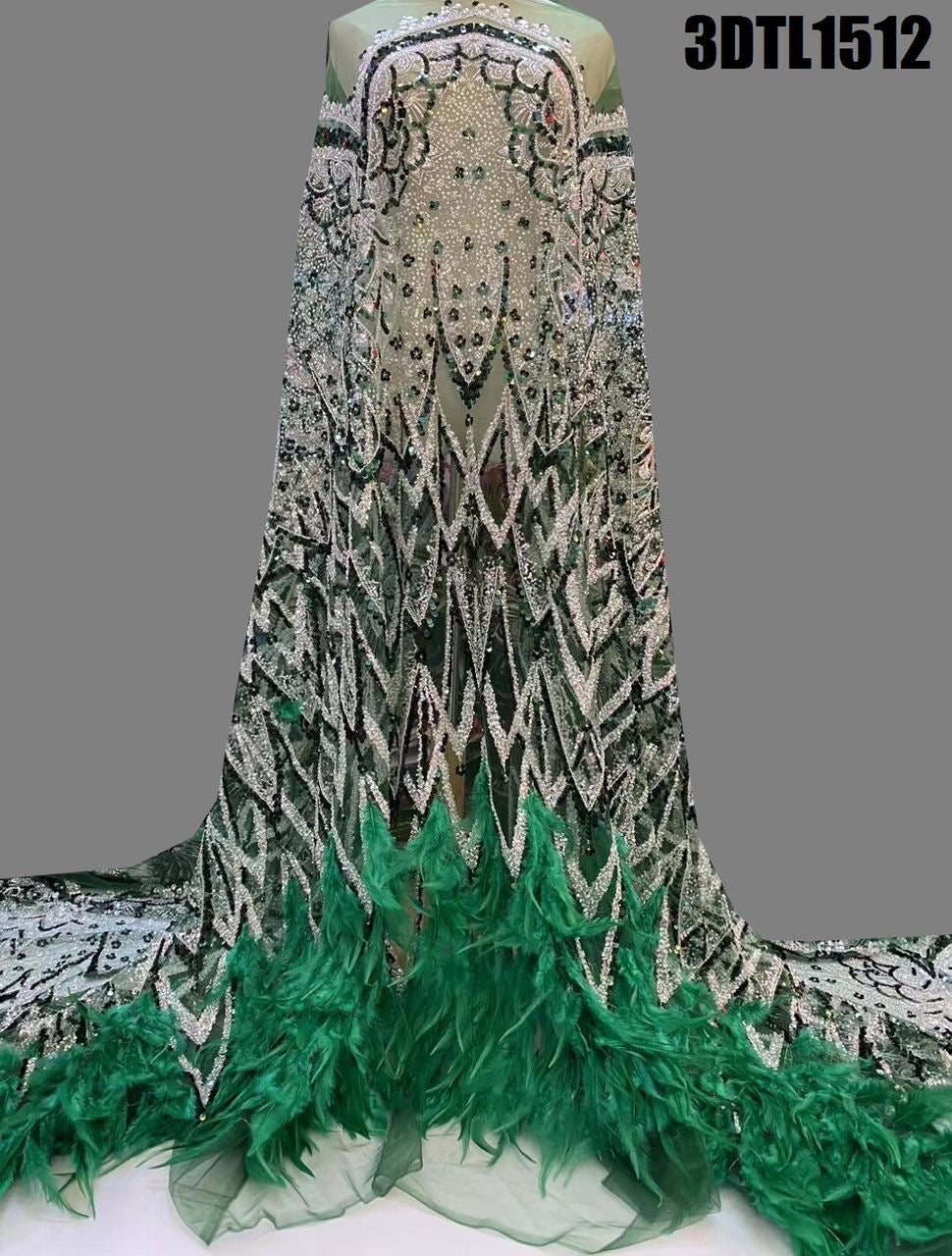 Tela real de lentejuelas y plumas