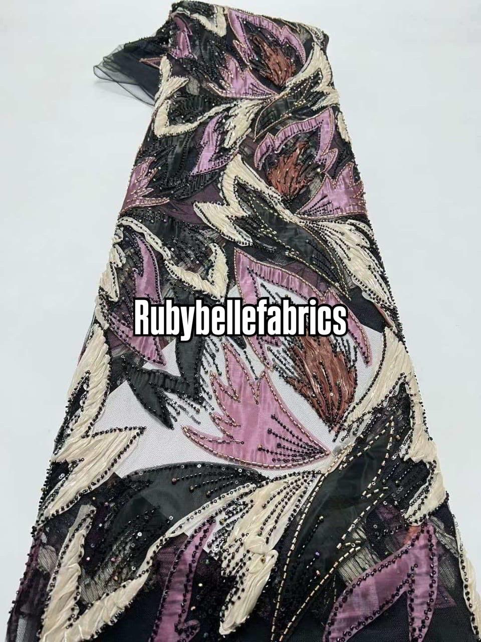Estic swirling leaf motif couture fabric