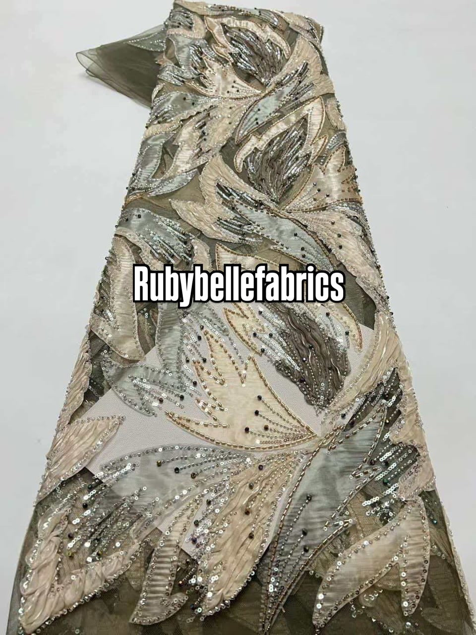 Estic swirling leaf motif couture fabric