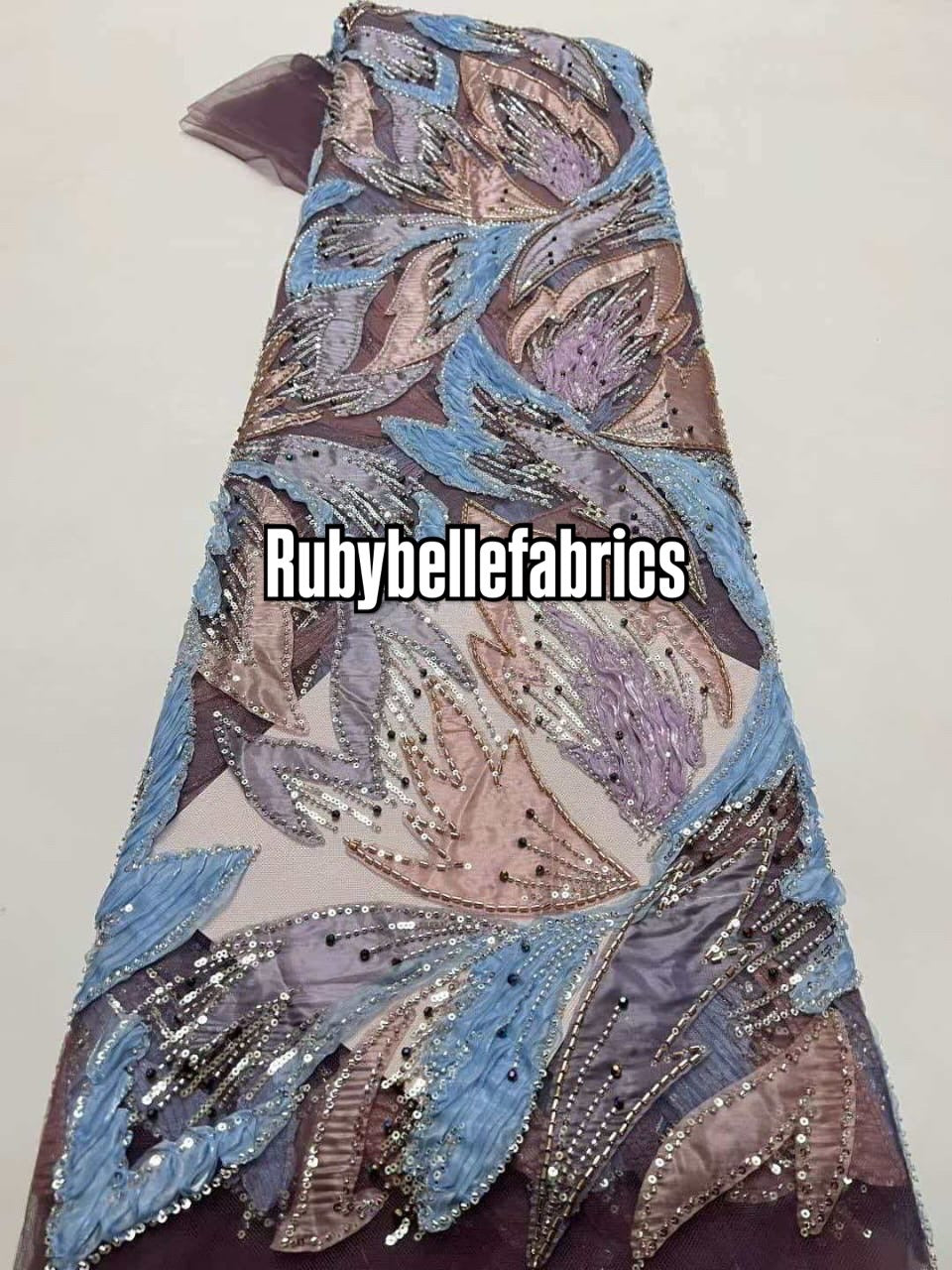 Estic swirling leaf motif couture fabric