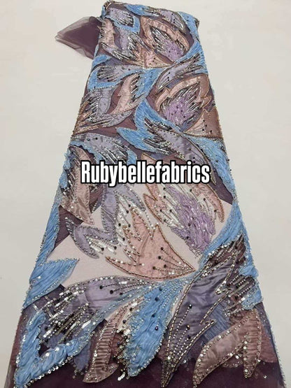 Estic swirling leaf motif couture fabric