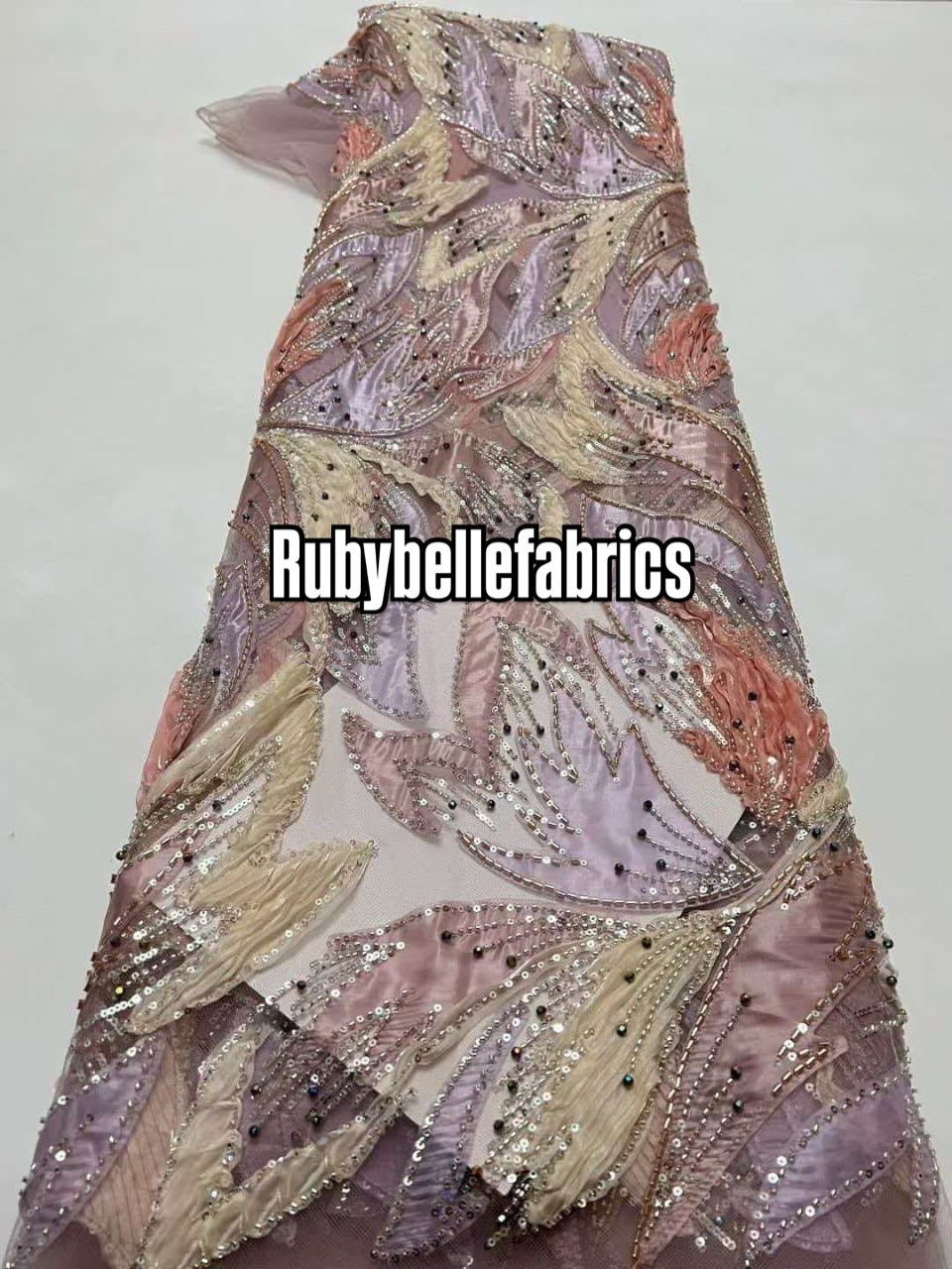 Estic swirling leaf motif couture fabric