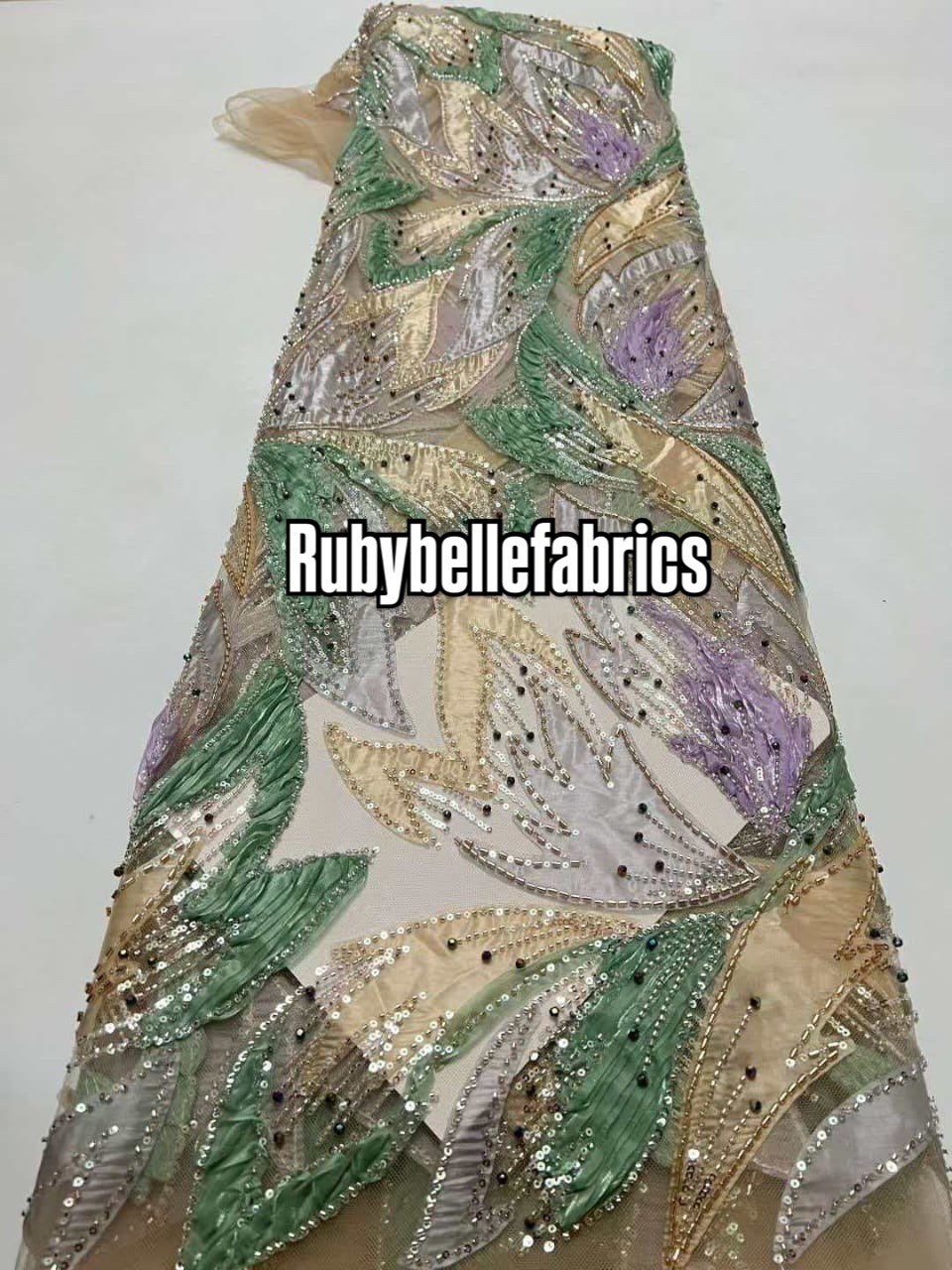 Estic swirling leaf motif couture fabric