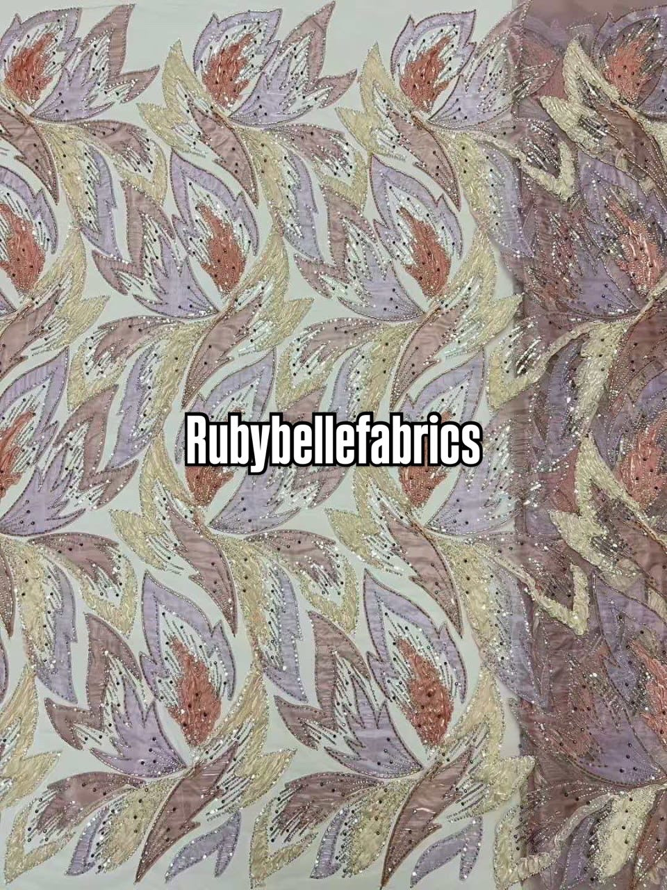 Estic swirling leaf motif couture fabric